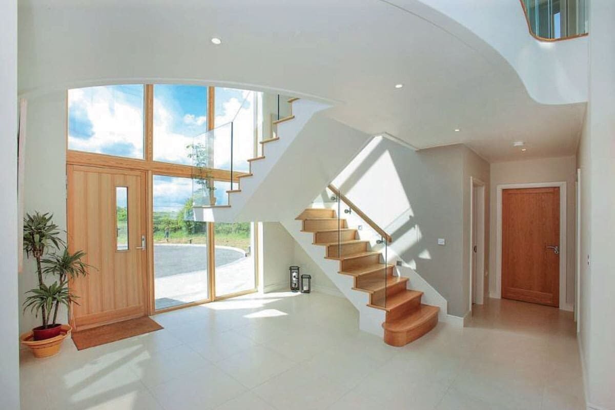 A modern white and wooden orange house.