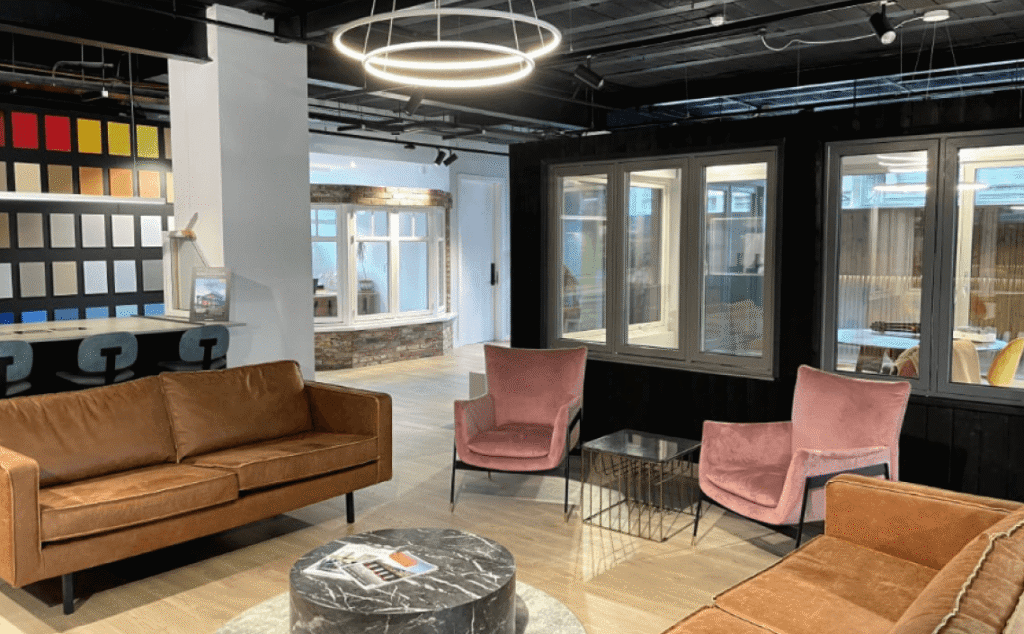 A modern showroom image showing seats & sofa's.