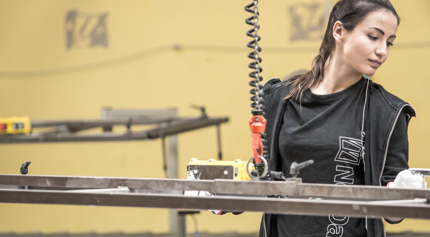 A woman working in a factory.