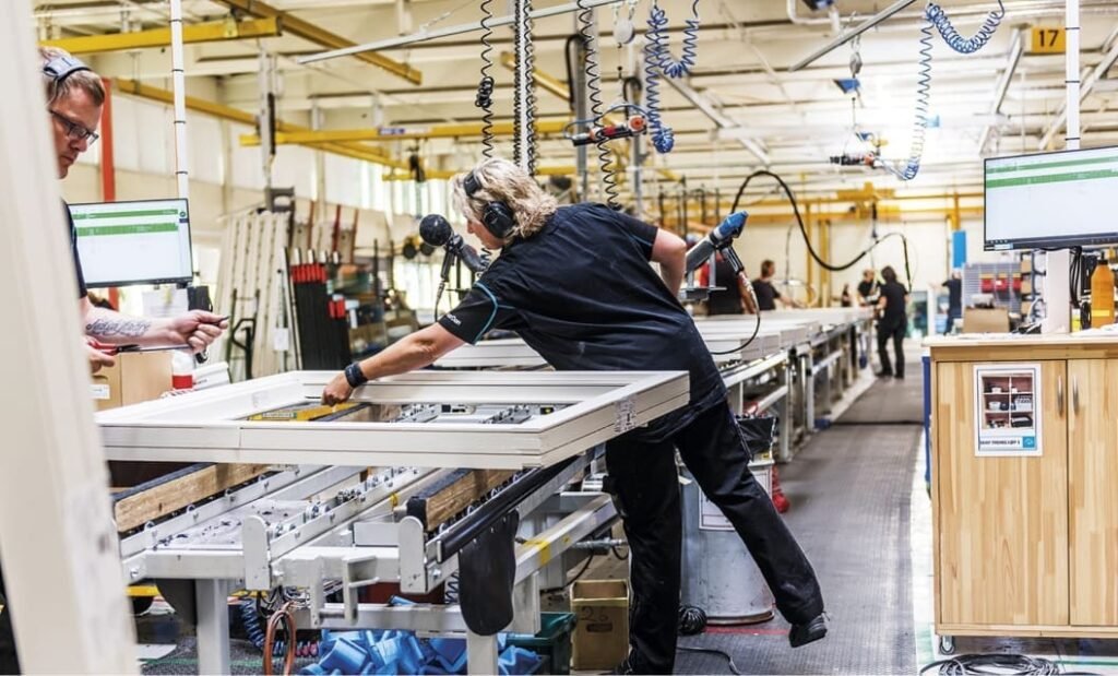 A woman working in a factory.