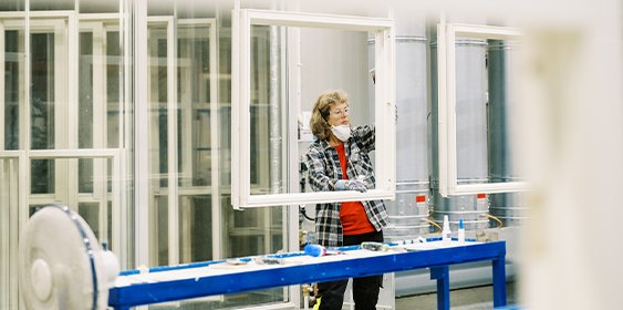 A woman working in a factory.